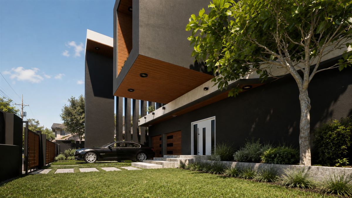 Entry and driveway of a contemporary home with timber-lined soffit and landscaped lawn